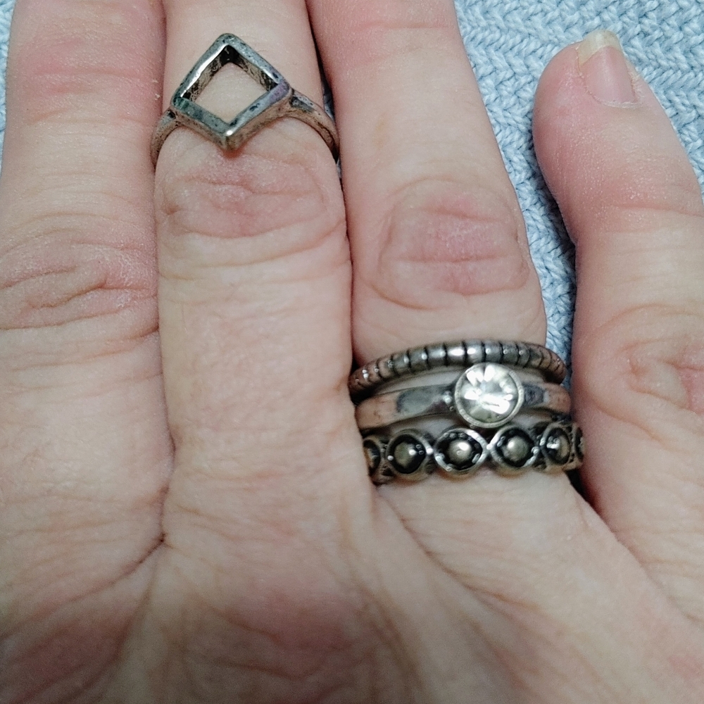 NWOT SET OF 4 FUN SILVERTONE RINGS